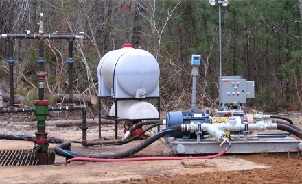 image of two wellsite operators walking the site